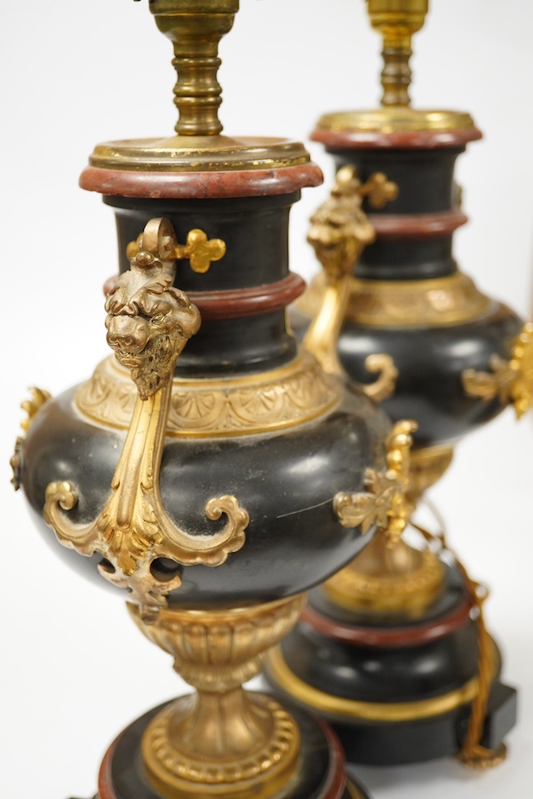 A pair of ormolu, rouge and black marble table lamps, 42cm including fitting. Condition - good